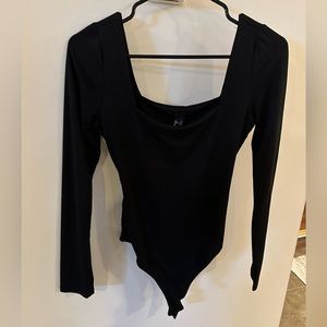 Black body suit thong with 2 buttons open back